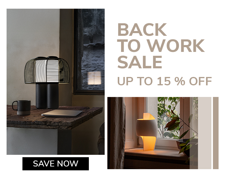 Black table lamp in dark interior
