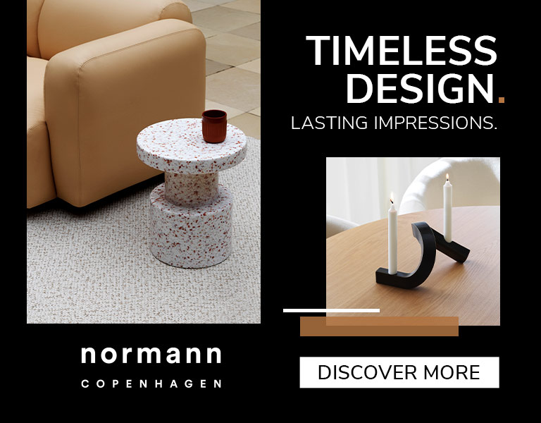 Modern designer table lamp with gold stem and white shade displayed on natural stone, promoting Black November sale with up to 40% off and text ‘First Black Deals’.